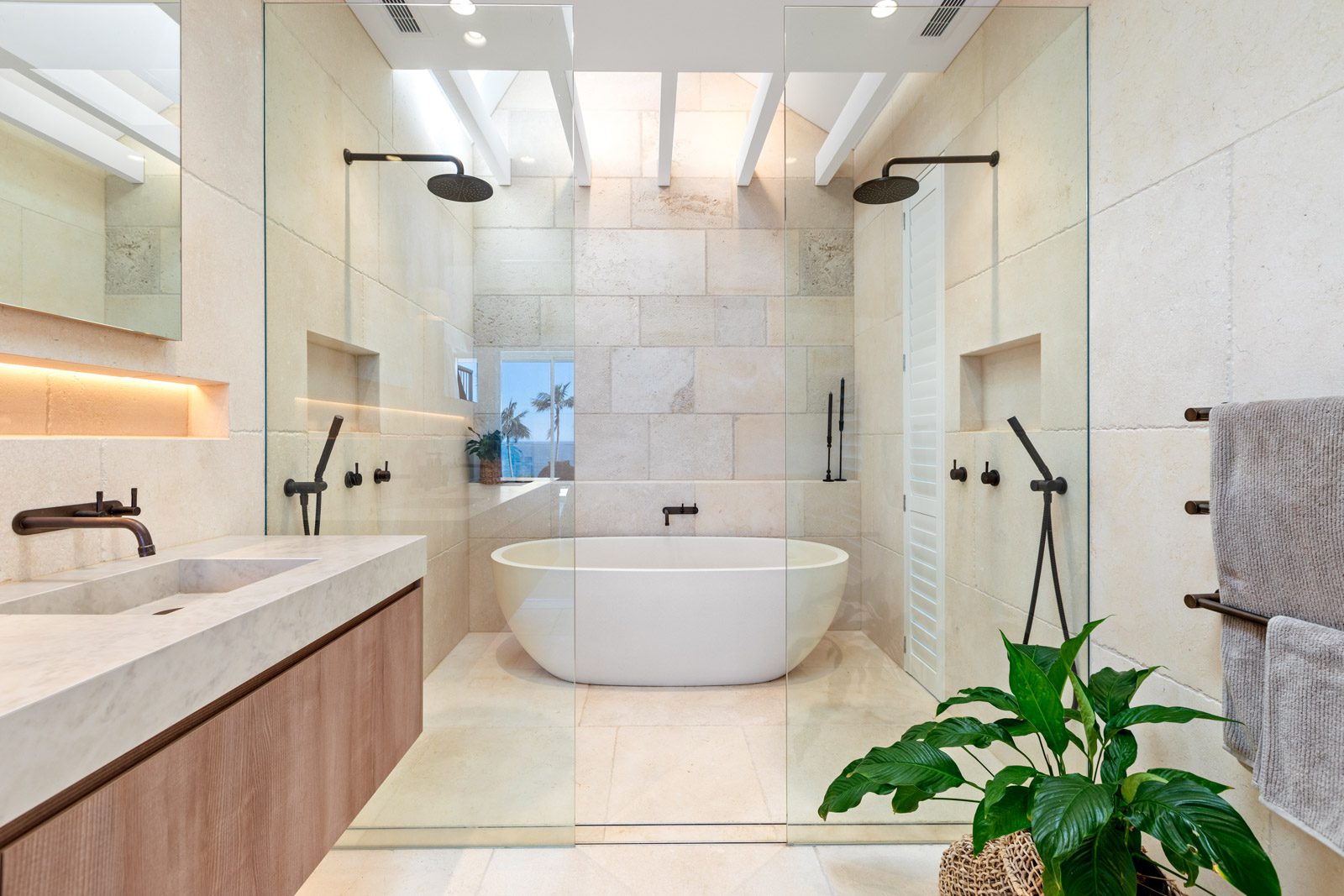 Frameless shower screen by First Class Glass, installed in a Northern Beaches home.