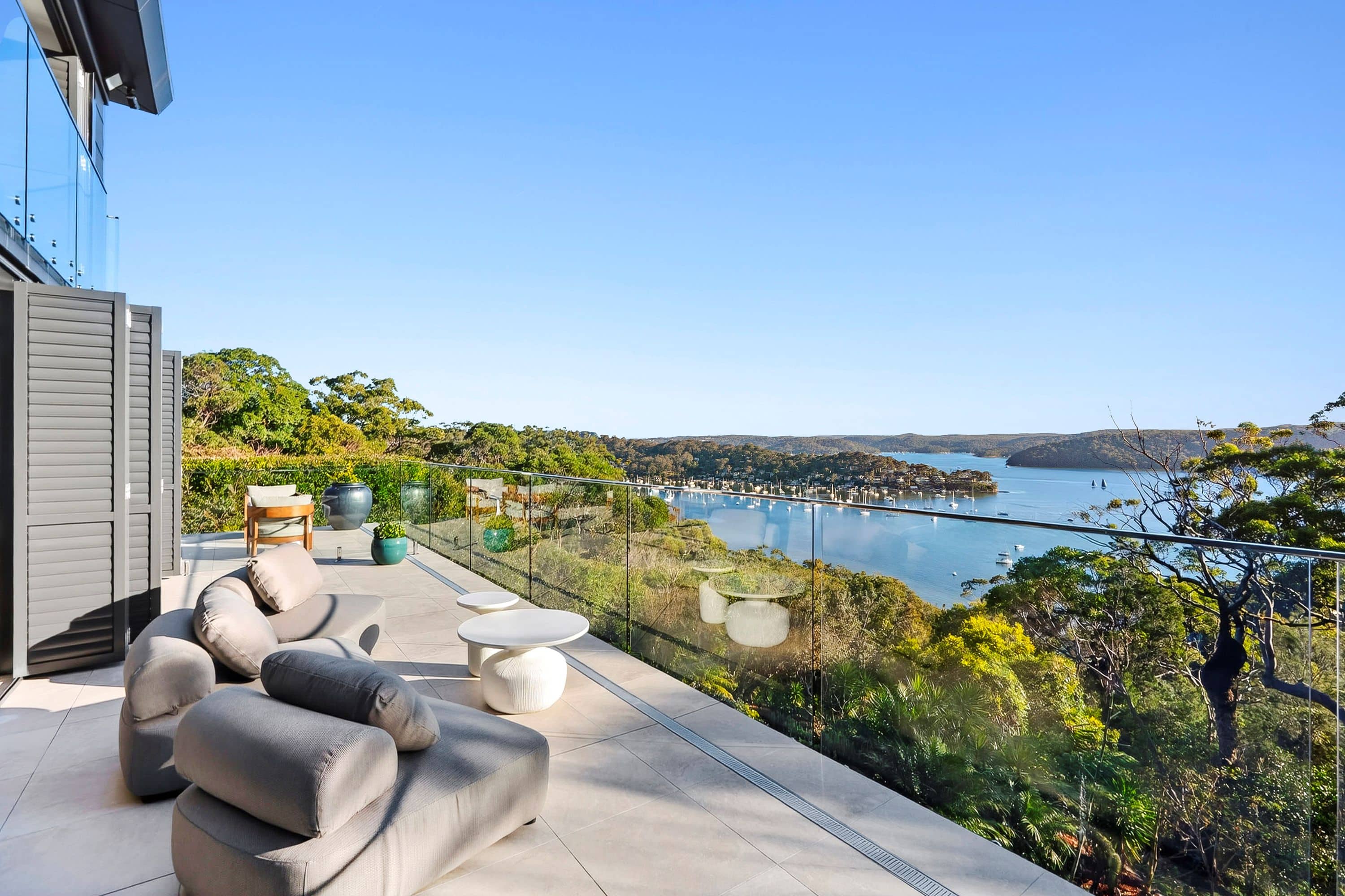 First Class Glass frameless balustrade overlooking Pittwater Harbour.